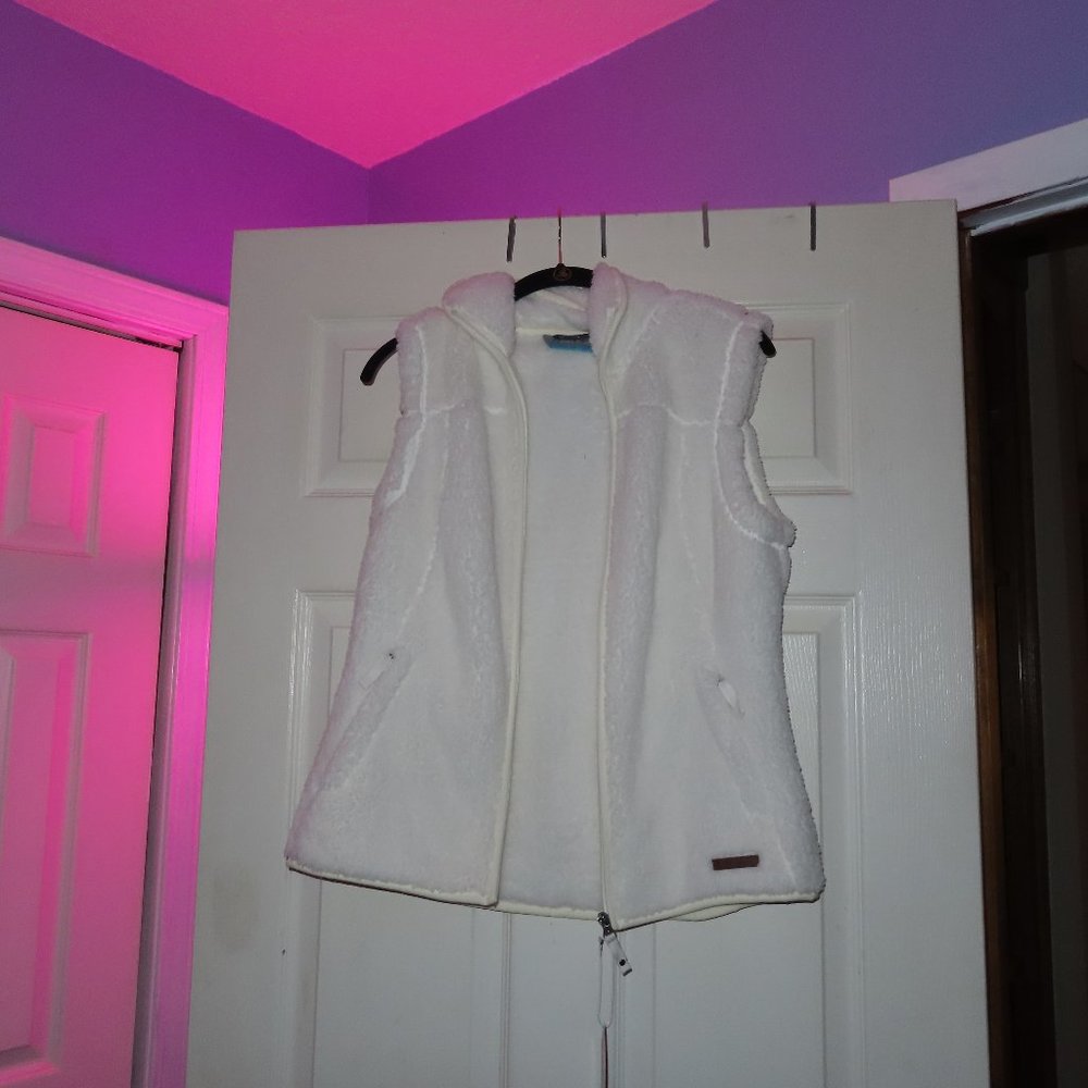 white fur vest